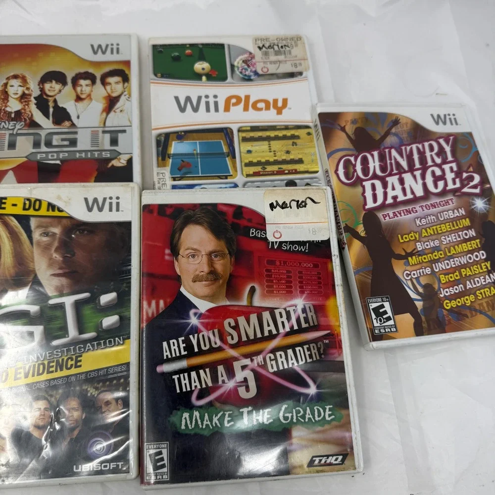 Nintendo Wii 7 Game Lot Wii Play Music Rapala CSI Disney Sing It Country Dance 2